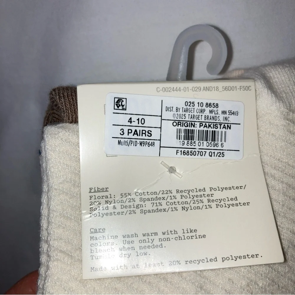 2 packs of A New Day Palm Women’s Print and Solid Brown and cream colored socks.